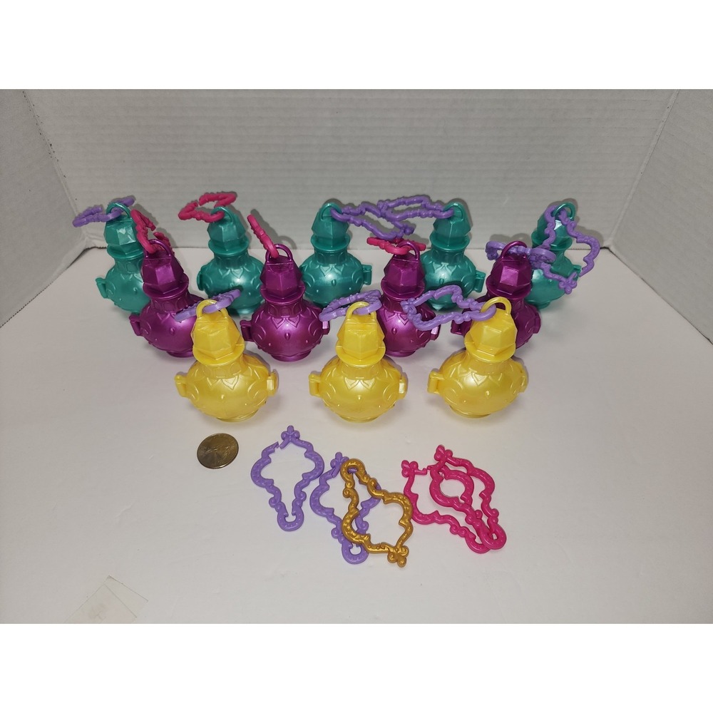 Ser of 12 twelve Fisher-Price Shimmer and Shine Teenie Genies empty bottles